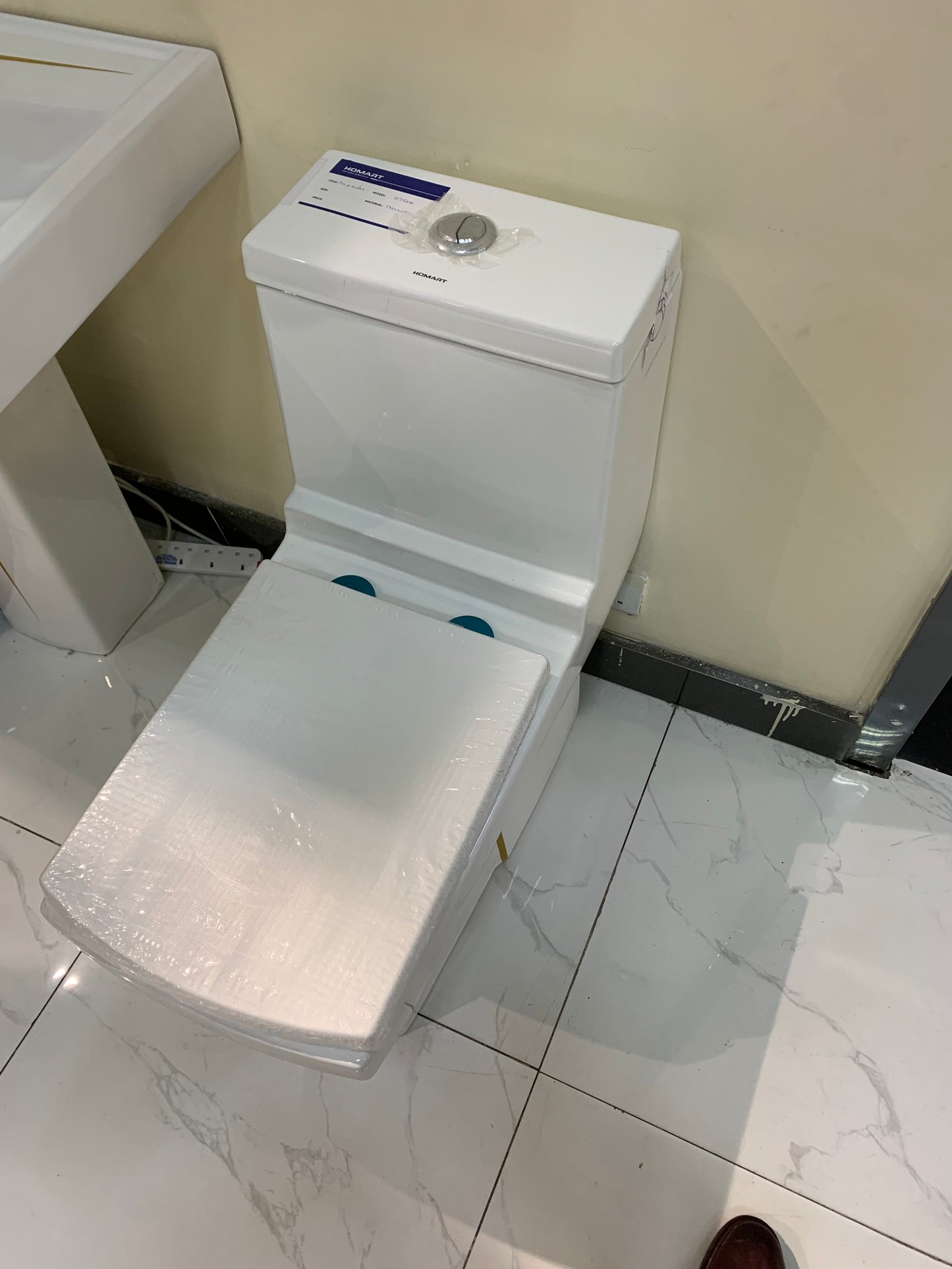 White & gold square shaped one piece toilets