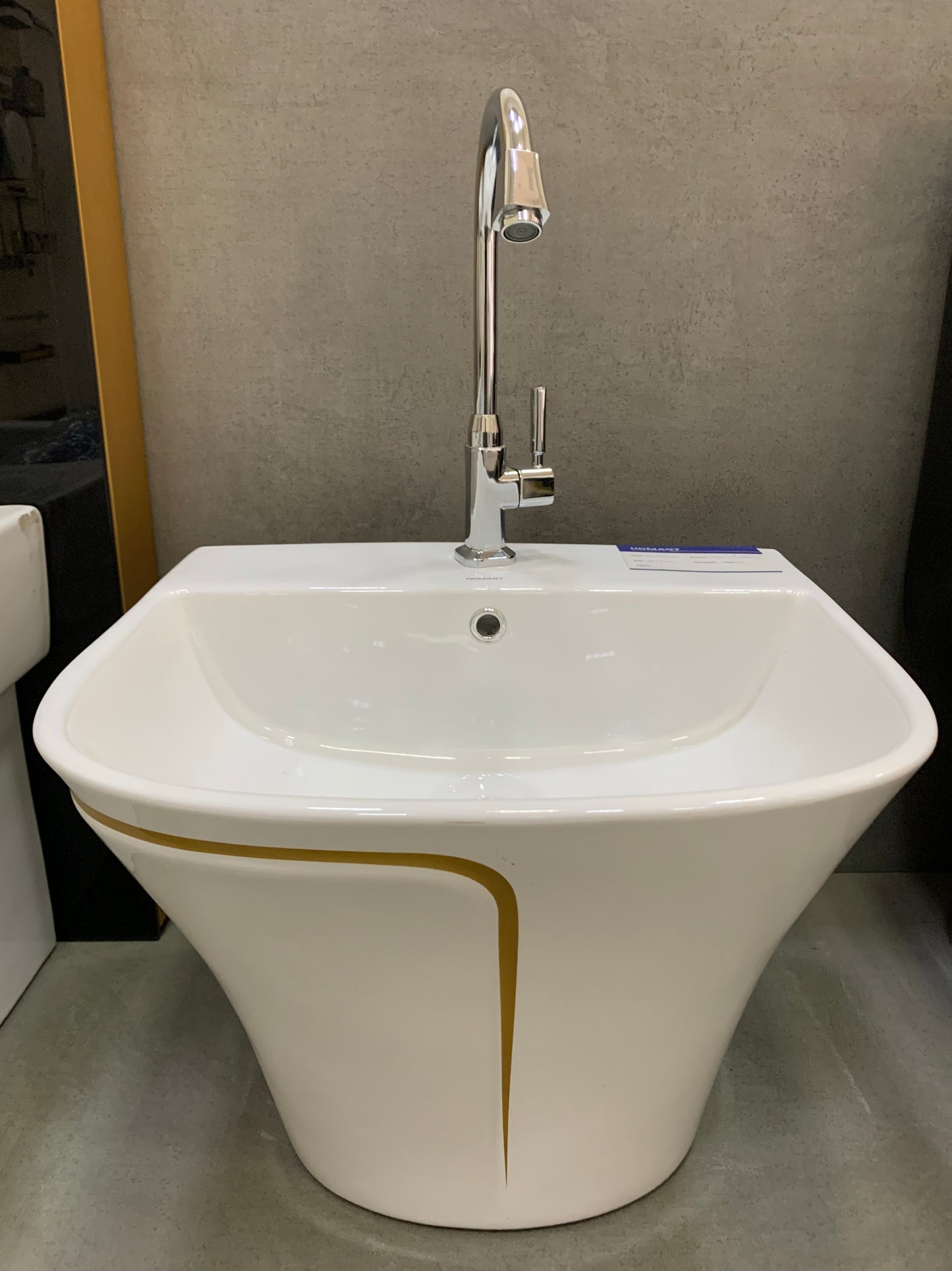 White with gold line wall hung basin